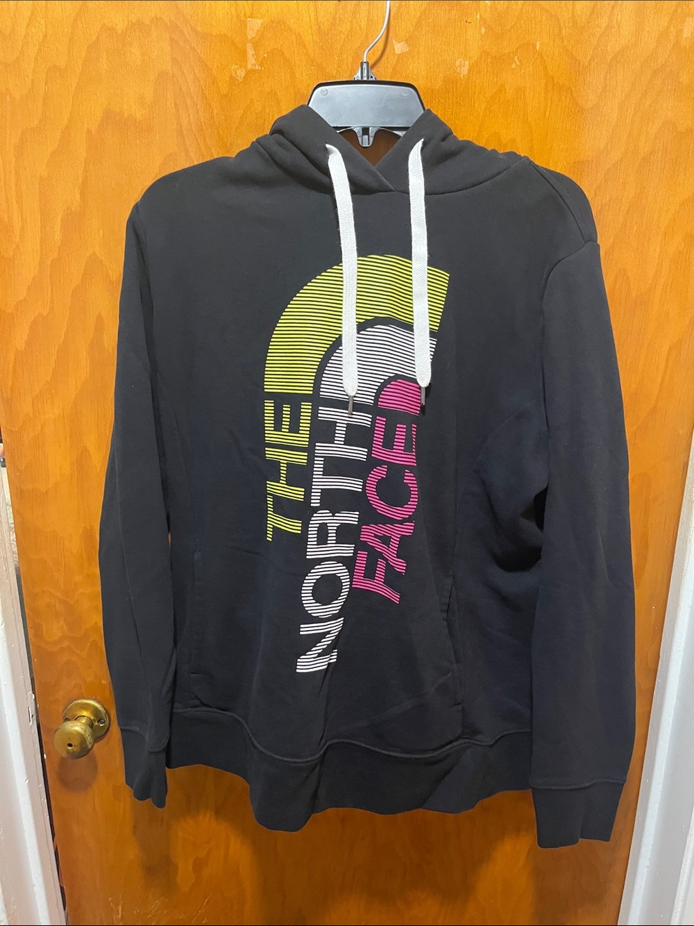 The North Face Black Hoodie with Neon Yellow and Neon Pink Logo